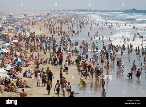 Crowds head to Huntington Beach to beat the heat 